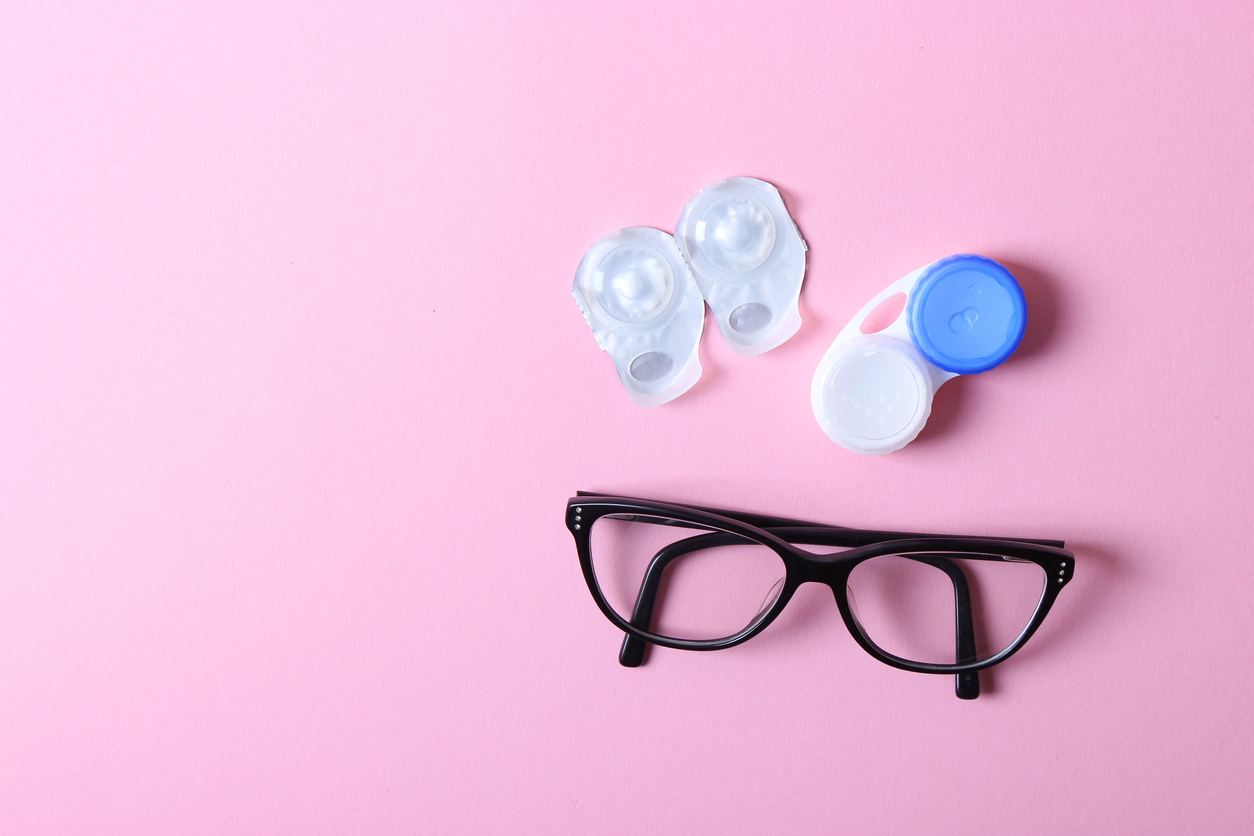 Glasses and lenses for correcting vision on a colored background. 