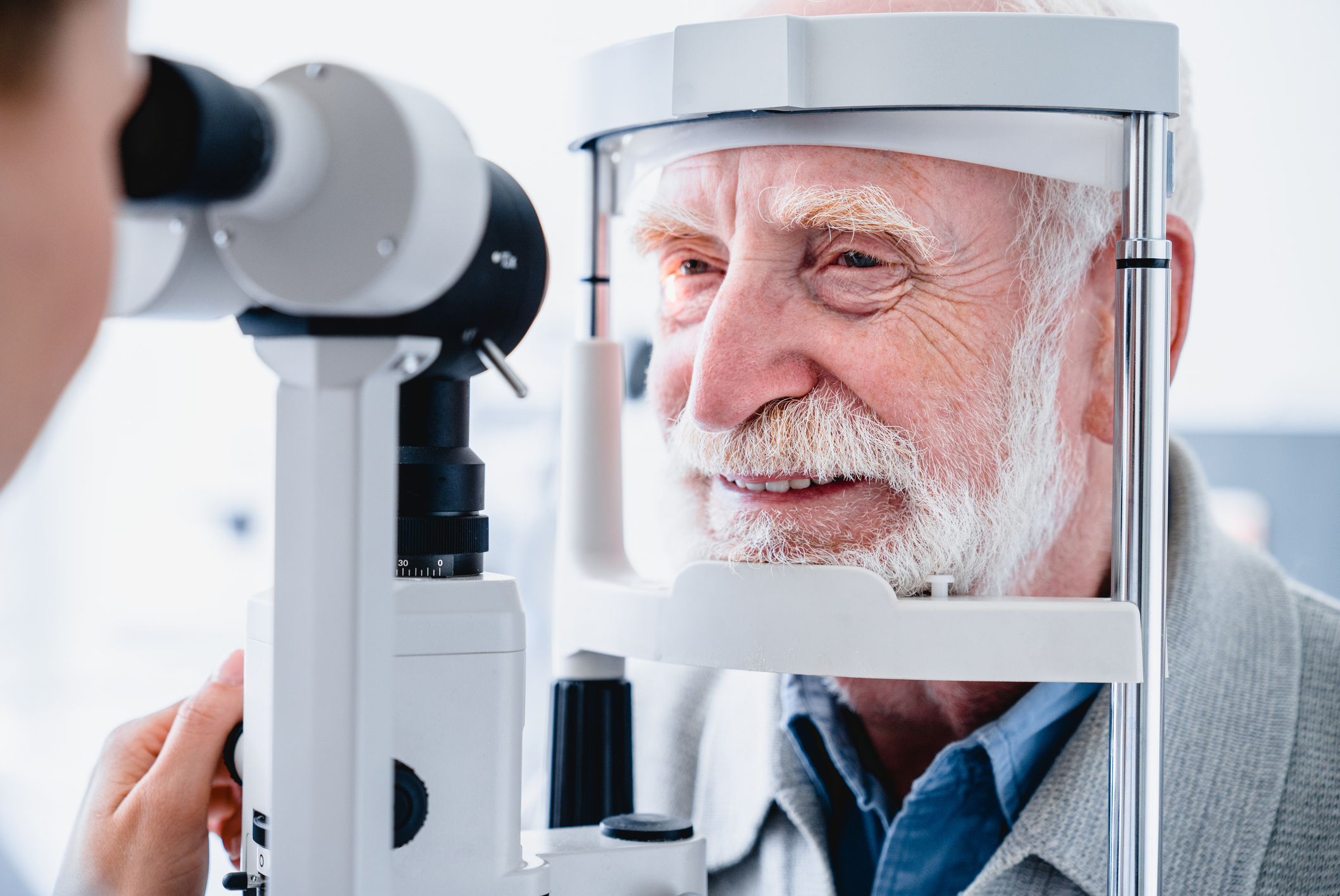 Image of an older man getting screened for glaucoma.