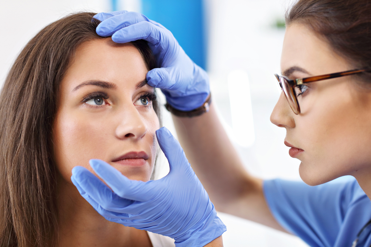female doctor and female patient during eye consultation