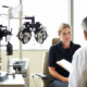 A woman listens to her opthamologist